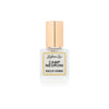 Camp Negroni Perfume Oil with gold cap on white background