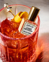 Camp Negroni Perfume Oil ready for a cocktail pairing