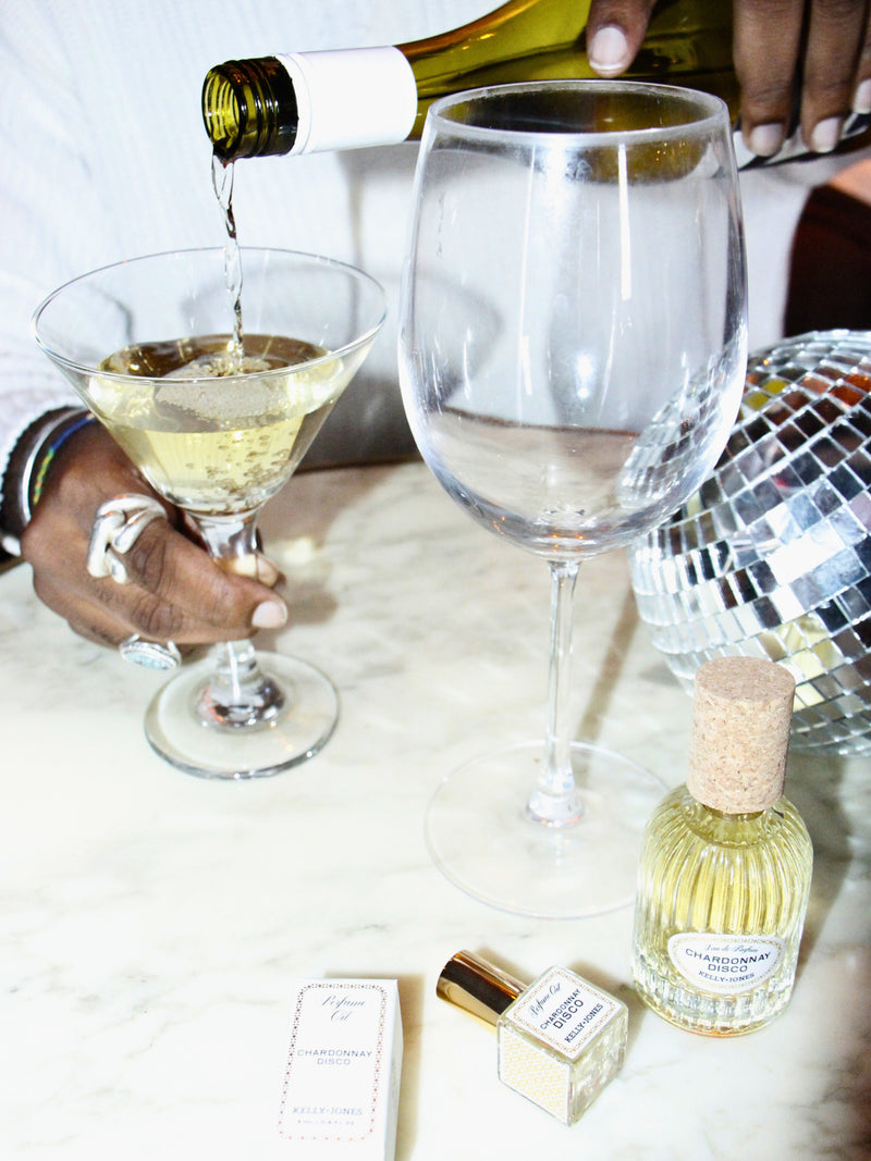 Chardonnay Disco Supper Club fragrance with disco balls and a pour of wine