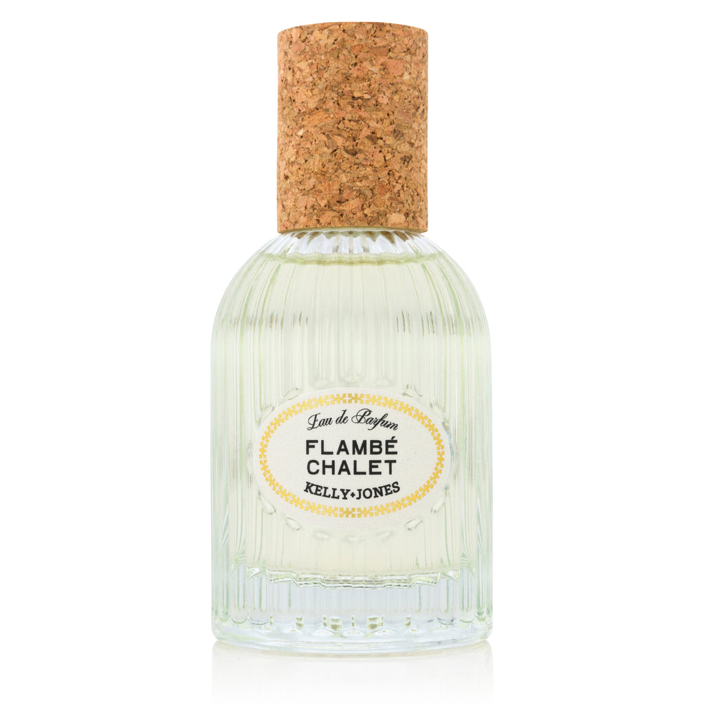 Flambe Chalet Eau de Parfum with ribbed bottle and cork cap on a white backdrop