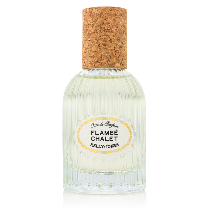 Flambe Chalet Eau de Parfum with ribbed bottle and cork cap on a white backdrop