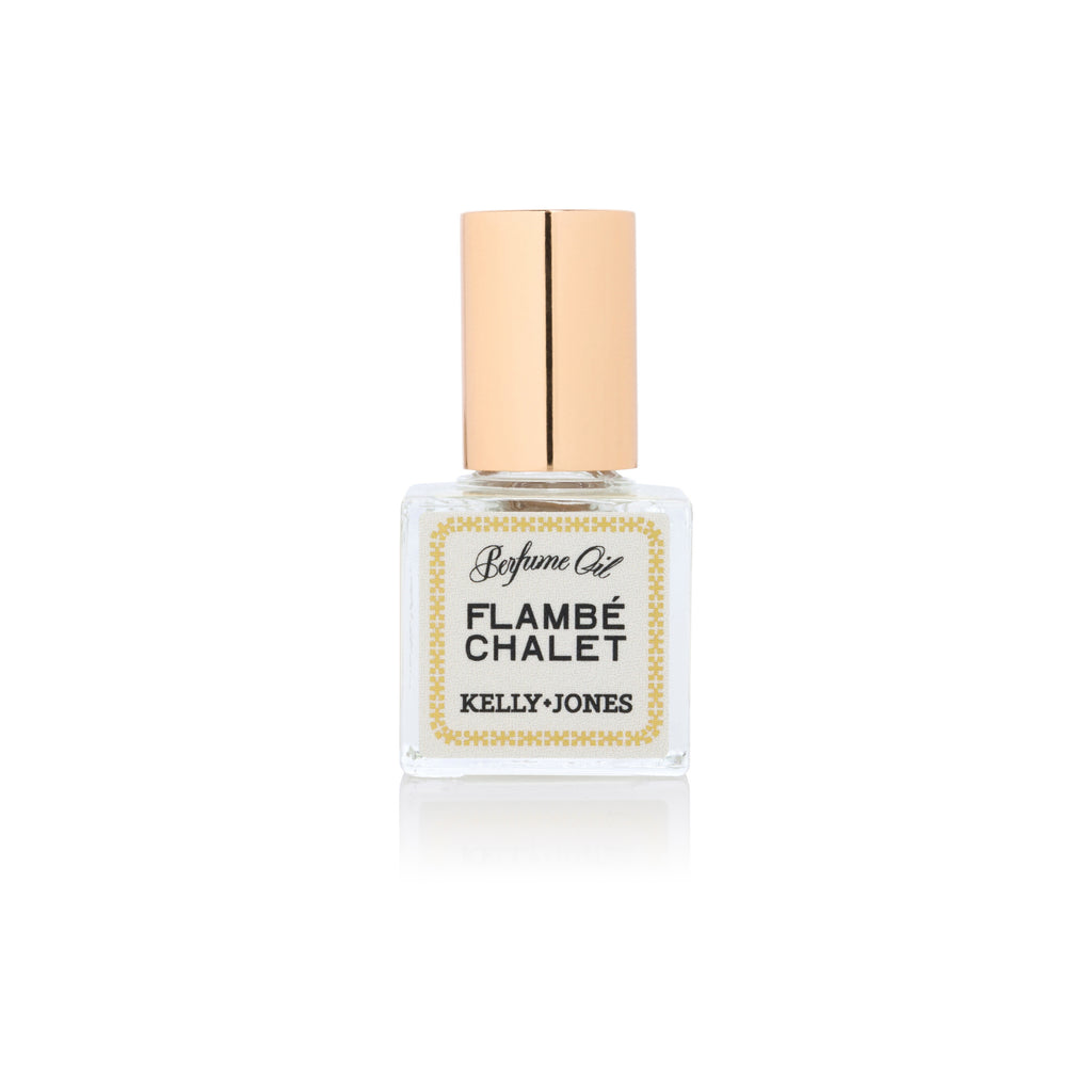 Flambe Chalet Eau de Parfum with ribbed bottle and cork cap on a white backdrop