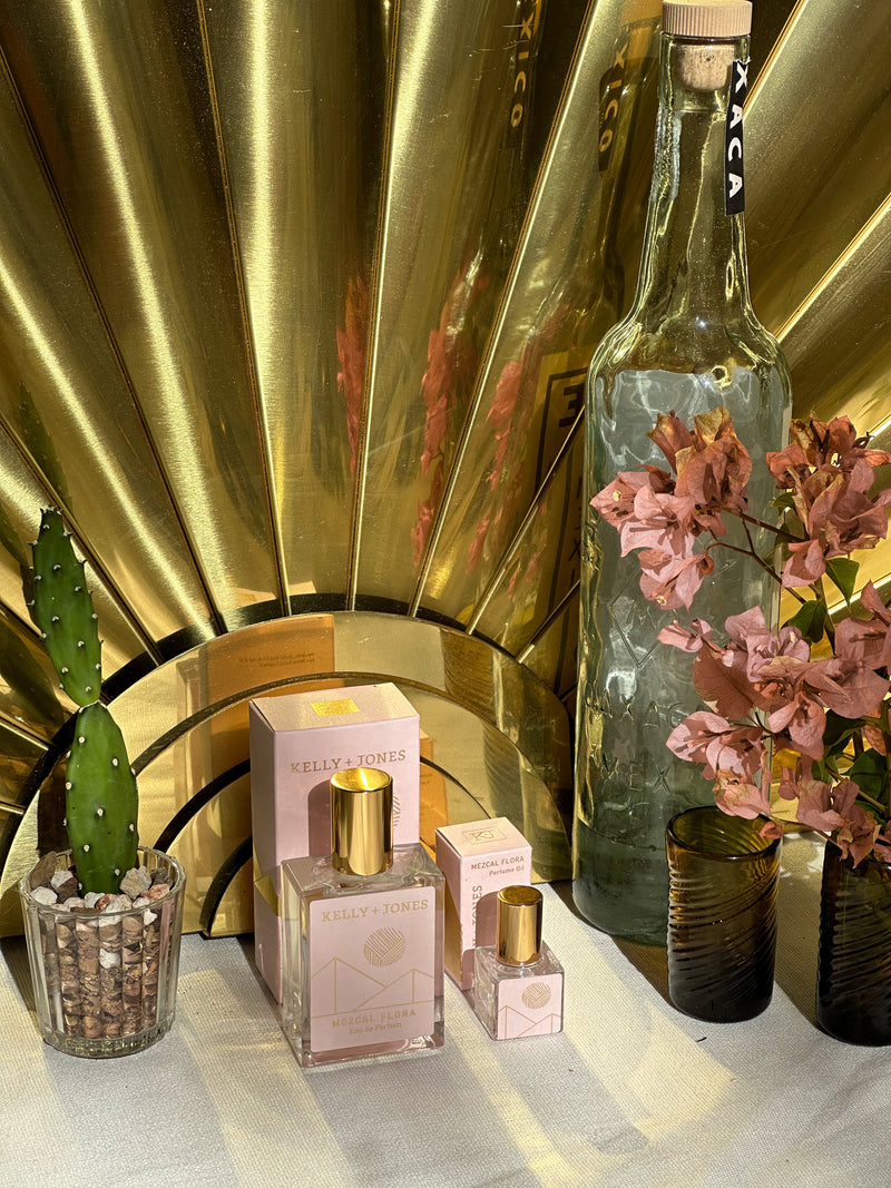 Mezcal Flora Eau de Parfum and Perfume Oil at the mezcaleria with bottles of mezcal and cactus