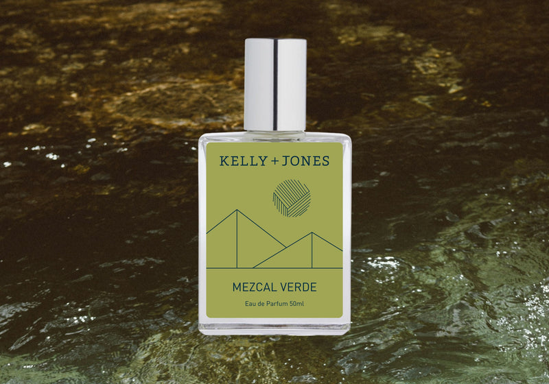 A bottle of Mezcal Verde Eau de Parfum in the jungle
