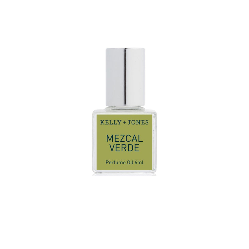 A bottle of Kelly + Jones Mezcal Verde Perfume Oil on a white background