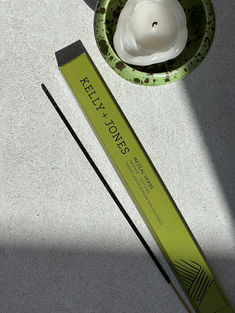 Mezcal Verde Incense stick ready to be lit, with sun shining on the setting